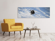 Load image into Gallery viewer, Panoramic Canvas Print A satellite above the clouds
