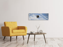 Load image into Gallery viewer, Panoramic Canvas Print A satellite above the clouds
