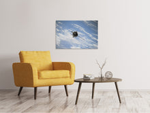 Load image into Gallery viewer, Canvas print A satellite above the clouds
