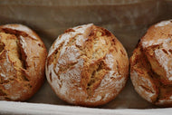 Photo Wallpaper Fresh rye bread rolls