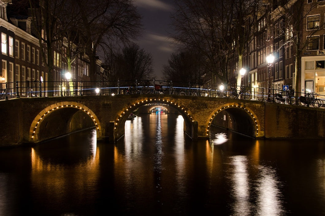 Photo Wallpaper At night in Amsterdam