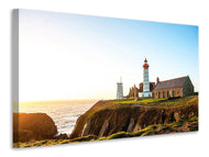 Canvas print The lighthouse at sunrise