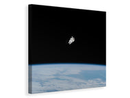 Canvas print Lonely astronaut in space