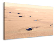 Canvas print Pebbles in the sand