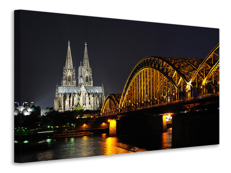Canvas print At night in Cologne