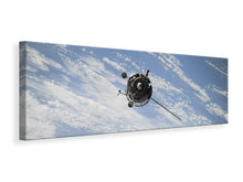 Load image into Gallery viewer, Panoramic Canvas Print A satellite above the clouds
